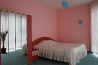Postel nebo postele na pokoji v ubytování Hotel Kamelia