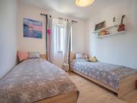 Posteľ alebo postele v izbe v ubytovaní Holiday Home Ivona by Interhome