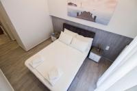 Postel nebo postele na pokoji v ubytování FLOW - White Tower Two Bedroom Suite
