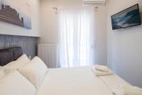 Postel nebo postele na pokoji v ubytování FLOW - White Tower Two Bedroom Suite