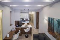 TV a/nebo společenská místnost v ubytování FLOW - White Tower Two Bedroom Suite