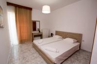 Posteľ alebo postele v izbe v ubytovaní KOS Family House