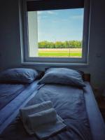 Posteľ alebo postele v izbe v ubytovaní Moment Apartments