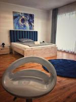 Posteľ alebo postele v izbe v ubytovaní Moment Apartments