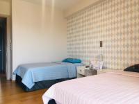 Postel nebo postele na pokoji v ubytování Luxury & Stylish Family Apartment