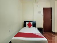 Postel nebo postele na pokoji v ubytování Al Rayan Hotel