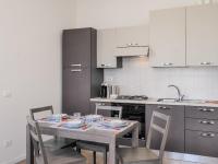 A kitchen or kitchenette at Le Case sul Parco