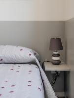 A bed or beds in a room at Le Case sul Parco
