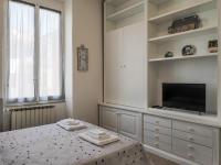 A bed or beds in a room at Le Case sul Parco