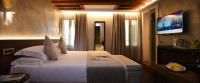 Posteľ alebo postele v izbe v ubytovaní Rosa Salva Hotel