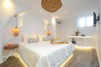 Posteľ alebo postele v izbe v ubytovaní Naxos Island Escape Suites