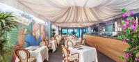 Reštaurácia alebo iné gastronomické zariadenie v ubytovaní Grand Hotel Continental