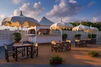 Reštaurácia alebo iné gastronomické zariadenie v ubytovaní Grand Hotel Continental