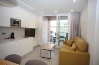 Televízia a/alebo spoločenská miestnosť v ubytovaní Iberflat APARTAMENTOS LOS PINOS