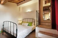 A bed or beds in a room at Bosco Ai Marzi