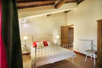 A bed or beds in a room at Bosco Ai Marzi