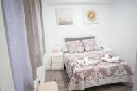 Postel nebo postele na pokoji v ubytování Hostal Goyesco Plaza