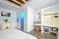 Posteľ alebo postele v izbe v ubytovaní Naxos Island Escape Suites