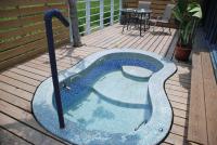 a small swimming pool on a wooden deck at Lotus Hostel Beicheng Zhuang in Luodong