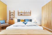 Postel nebo postele na pokoji v ubytování Vintage Design Apartment