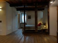 A bed or beds in a room at Casa Pietra