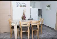 Kuchyň nebo kuchyňský kout v ubytování Cristi Apartments