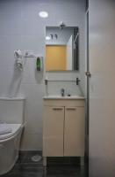 A bathroom at Good Stay Rooms