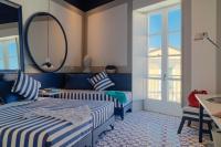 A bed or beds in a room at Maison Il Conservatorio