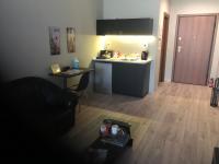 A kitchen or kitchenette at DISTRiCT 01-Luxury Urban Lofts