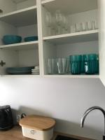 Kuchnia lub aneks kuchenny w obiekcie Apartament Gardenia Sea&Sun DZIWNÓW PRZY PLAŻY