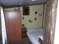 A bed or beds in a room at VLASSIS APTS -ΜΕΛΙΔΟΝΙ-ΔΙΑΜΕΡΙΣΜΑ ΒΑΣΙΛΙΚΗ