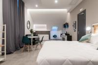 Posteľ alebo postele v izbe v ubytovaní Residence Hotel Moderno