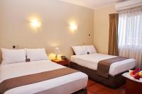 Cama o camas de una habitación en DM Hoteles Nasca