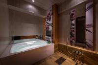 HOTEL ZEN 一宮 (大人専用)にあるベッド