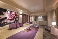 HOTEL ZEN 一宮 (大人専用)にあるベッド