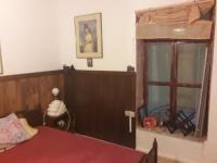 A bed or beds in a room at VLASSIS APTS -ΜΕΛΙΔΟΝΙ-ΔΙΑΜΕΡΙΣΜΑ ΒΑΣΙΛΙΚΗ