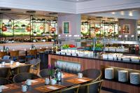 Ein Restaurant oder anderes Speiselokal in der Unterkunft Lagoona by Isrotel Collection 