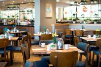 Ein Restaurant oder anderes Speiselokal in der Unterkunft Lagoona by Isrotel Collection 