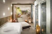 A bed or beds in a room at Grand Hotel Salsomaggiore