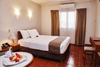 Cama o camas de una habitación en DM Hoteles Nasca