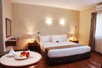 Cama o camas de una habitación en DM Hoteles Nasca
