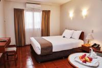 Cama o camas de una habitación en DM Hoteles Nasca