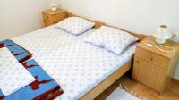 Postel nebo postele na pokoji v ubytování Apartments Tatjana