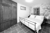 Postel nebo postele na pokoji v ubytování Villa Kamena