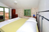 Postel nebo postele na pokoji v ubytování Villa Kamena