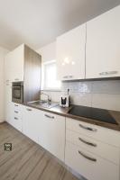 Kuchyňa alebo kuchynka v ubytovaní Carmen Apartment Deluxe