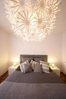 Posteľ alebo postele v izbe v ubytovaní Carmen Apartment Deluxe