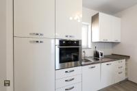 Kuchyňa alebo kuchynka v ubytovaní Carmen Apartment Deluxe