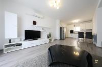 Televízia a/alebo spoločenská miestnosť v ubytovaní Carmen Apartment Deluxe