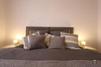 Posteľ alebo postele v izbe v ubytovaní Carmen Apartment Deluxe